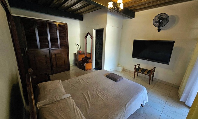 Garzon Bed & Breakfast | Matrimonial Suite - Exclusive area with hammock in front of the Swimming Pool