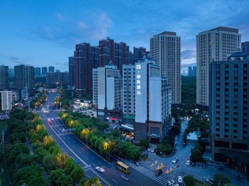 Yu Hua Hotel | Mehood Lestie, Changsha High-speed Railway South Station Sports New City