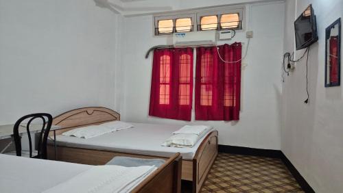 Sualkuchi House | Mini Home AC Family room