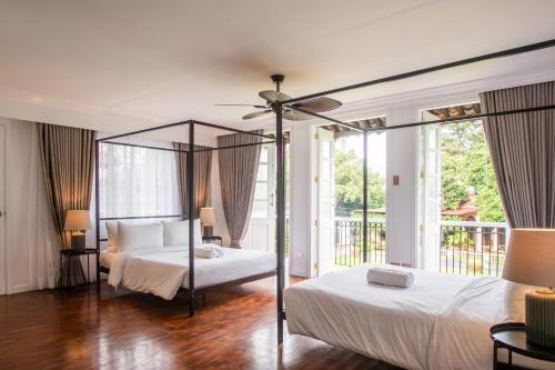 Bagong Lipunan Ng Crame Apartment | MiraNamin Nest GUMAMELA Suite in Unique Historic Home with View, Pet Friendly with a Fee