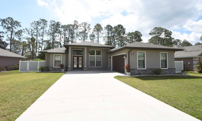 Palm Coast House | Modern 3BR Retreat Heated Pool & Large Game Room