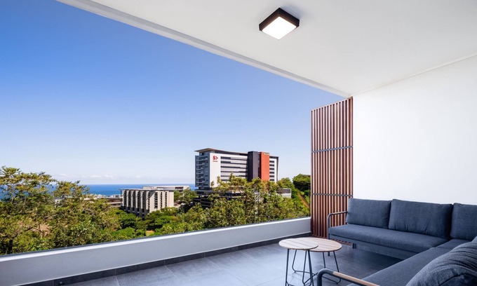 Umhlanga Ridge Apartment | Modern Apartment with Sea Views , Sauna , Pool