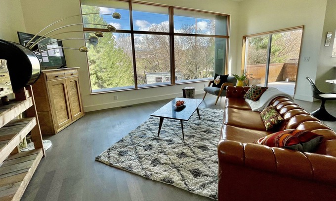 Riverfront Apartment | Modern, bright and spacious apartment with mountain views.