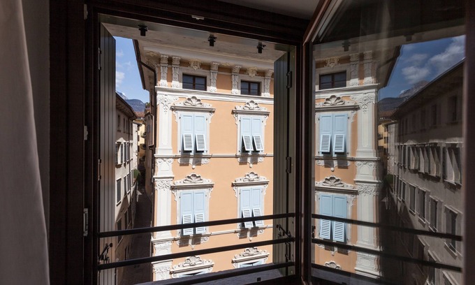 Riva del Garda Apartment | Modern, Centrally Located Apartment "RivApartmentsDowntowN - Love" with a View of the Old Town of Riva del Garda, A/C & Wi-Fi