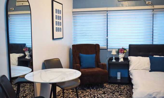 Loyola Heights Condo | Modern Chic Condo with Pool & Gym in Katipunan Ave, Quezon City - Slate Studio