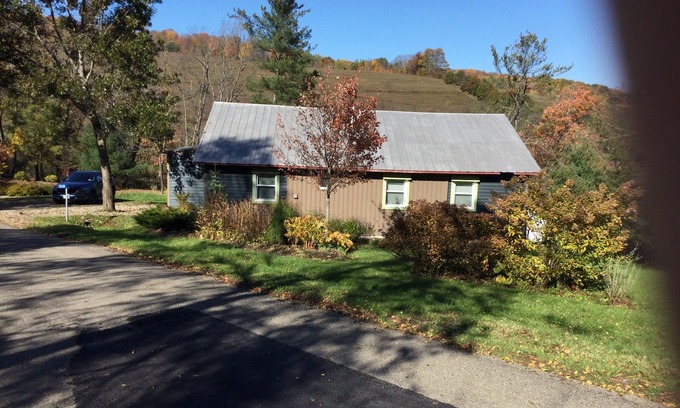 Black Creek Cottage | Modern cottage located in 250 private acres Pond Fishing Hiking Fire Pit