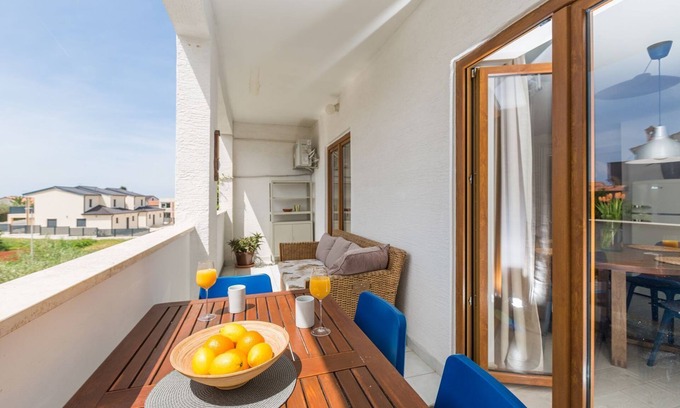 Gulici Apartment | Modern flat with stylish furnishings, sea view, private balcony, barbecue, air conditioning, WiFi