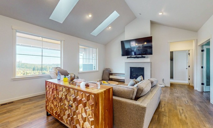 Union House | Modern home with fireplace, private patio, remote workspace, & golf nearby