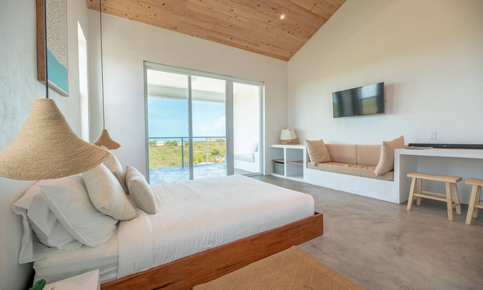 Long Bay Apartment | Modern Studio with Expansive Ocean View, Pool
