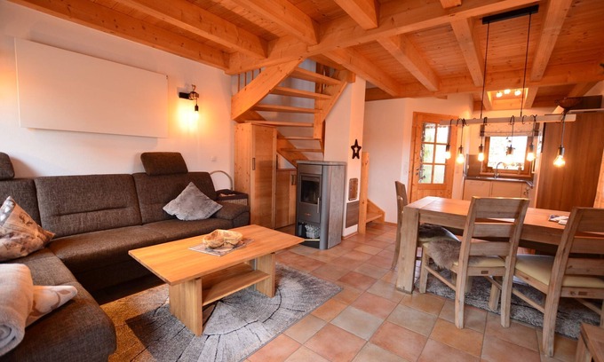 Lechbruck House | Modern vacation home by the lake in the Via Claudia vacation village with balcony and fireplace