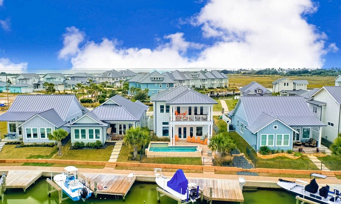 Rockport House | Modern, waterfront home with private pool, dock, balconies, central AC, and WiFi