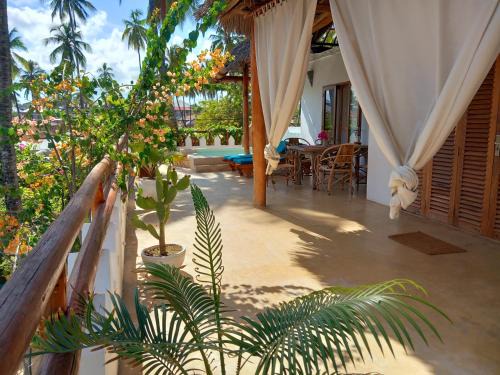 Pwani Mchangani Apartment | MOYO top floor apartment