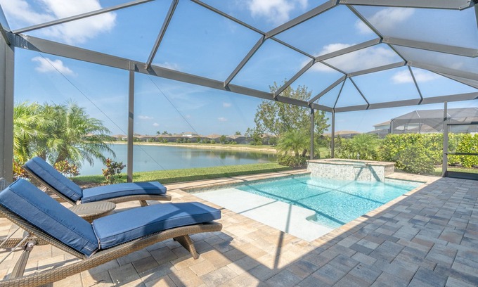 Naples House | π΄ Naples Reserve Lakeview Escape | Lanai w/Pool & Hot Tub, Outdoor Kitchen, EV & Pet Friendly