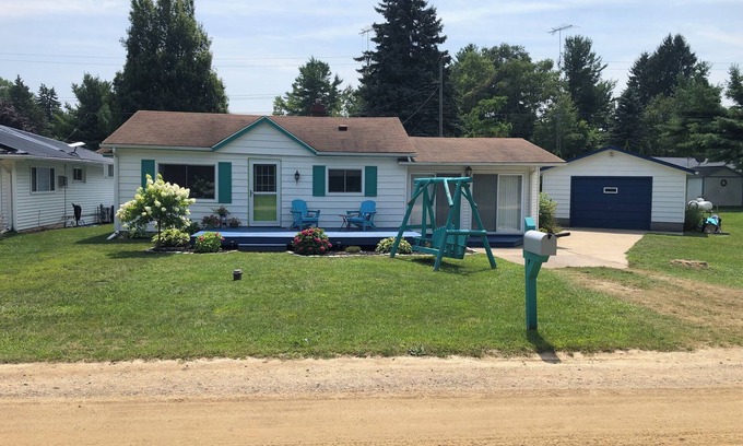 Deckerville Cottage | Nestled close to a sandy, secluded beach, this is a cozy retreat.