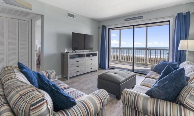 Golden Mile Condo | NEW Raintree Villas - Oceanfront view, one block from beach, Wifi included