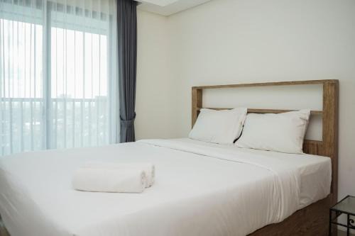 Pondok Aren Apartment | Nice and Homey Studio at Bintaro Embarcadero Apartment By Travelio