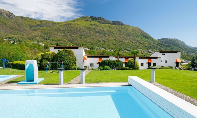Capriasca Apartment | Nice apartment for 4 guests with WIFI, pool, TV, patio, pets allowed and panoramic view