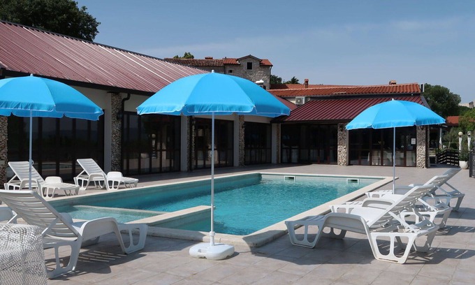 Krsan Villa | Nice apartment in villa for 6 people with WIFI, A/C, pool, TV, patio and pets allowed