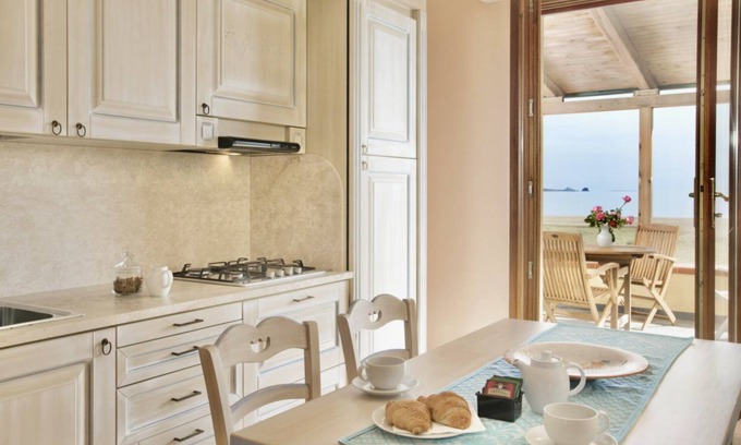 Bosa Marina Apartment | Nice apartment on the first floor with sea view of about 45 m2 equipped with air conditioning and wi fi connection, composed of a living room with equipped kitchenette, fridge and flat screen television.A double or twin bedroom and a single bedroom, bath