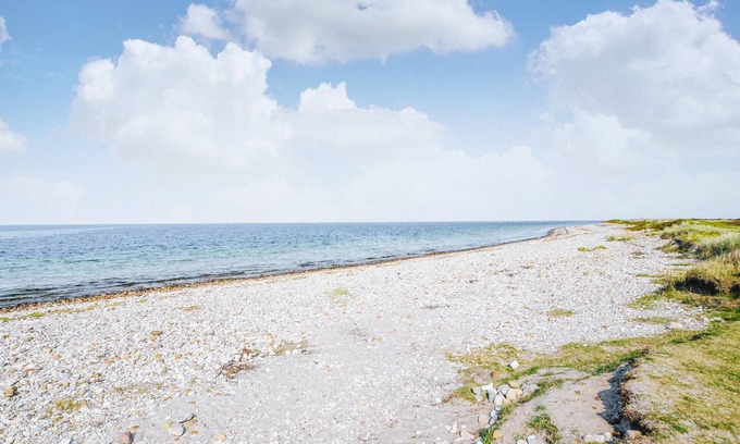 Rrvig House | Nice cottage with wood stove and idyllic garden, close to wonderful sandy beach.