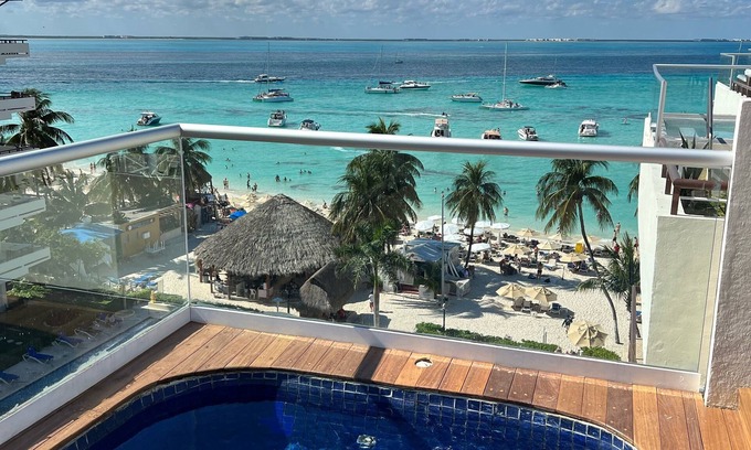 Centro - Supmza 001 Hotel | Oceanfront Modern Penthouse in Playa Norte text us 317-652-1366