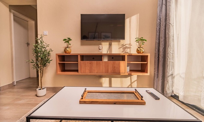 Blantyre Apartment | Oh wine at Lucas place