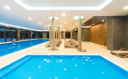 Kolobrzeg Apartment | OnHoliday Apartamenty ze strefą Wellness & Family, ulica Muszelkowa