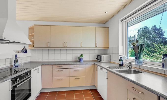Læsø House | Only 300 m from the beach and the sea, this vacation home near Læsø Strand awaits you.