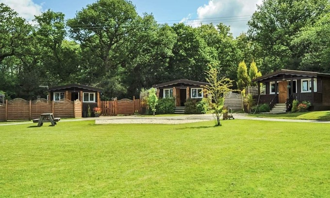 Ystradgynlais Ski Chalet | Open plan lodge with two doubles, both with TV/DVD.