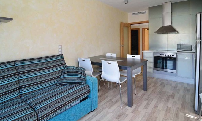 Sant Carles de la Rapita Apartment | ORNIS "Botiguer": 2bedrooms+sofa-bed 4/6 pers. balcony garden view