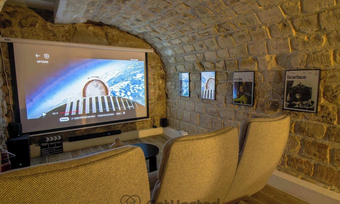 Quartier de la Porte-Saint-Denis Apartment | Paris Hideaway: Private Cinema – GetHosted