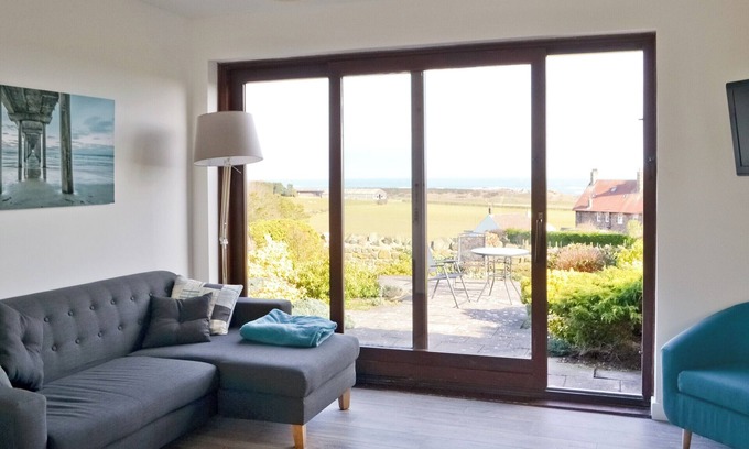 Embleton Cottage | Part of a small terrace of bungalows with uninterrupted views towards the sea.