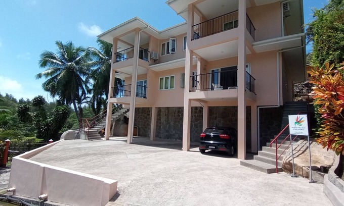 Anse aux Pins Apartment | Peace in Paradise with mountain views and 5 minutes walk to the beach