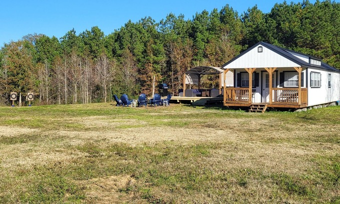 Broaddus House | Peaceful and Private Cabin with fun activities for family & friends on 25 Acres