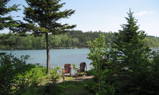 Cushing Cottage | Peaceful, cozy one-bedroom waterfront carriage house steps from our private cove