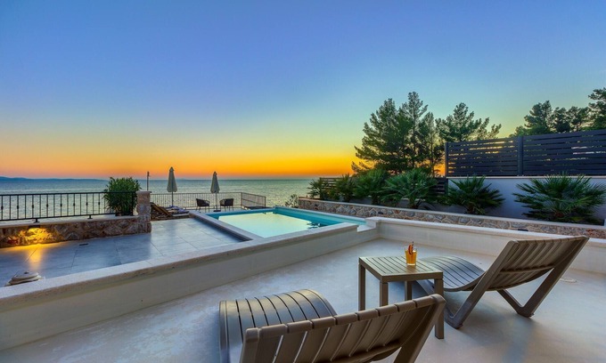 Ivan Dolac Villa | Peaceful Villa Luce di Mare - heated pool, sauna, seafront, seaview, family, stylish, pet friendly