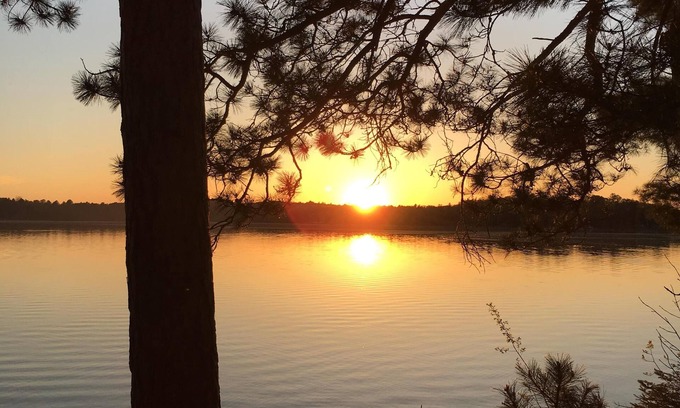 Fifty Lakes Cabin | Peaceful Vintage 1920's Lakefront Red Log Cabin