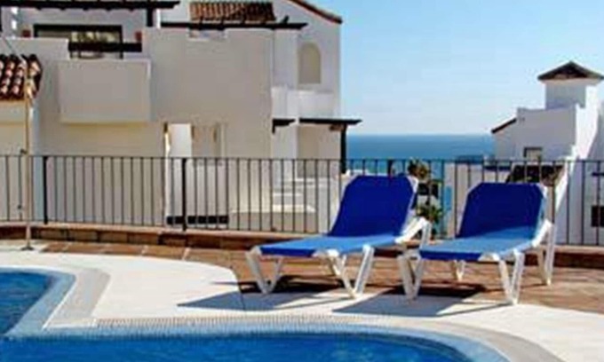 San Roque House | Penthouse in La Alcaidesa with Great Views, Shared Pool, A/C & Wi-Fi