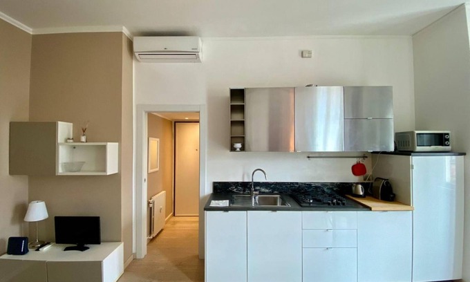 Acquabella Apartment | Piazzale Susa Bright Flat with Veranda