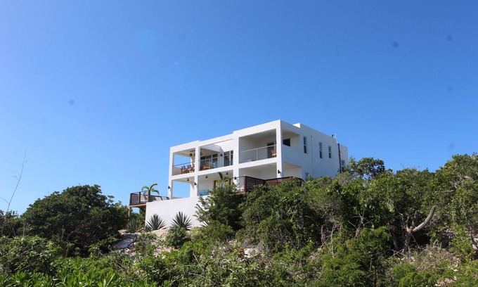 Long Bay Hills House | Ponciana House Ridgetop Sea View with Pool