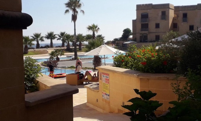 Ghajnsielem Apartment | Poolside Luxury Apartment with Patio 11A4S