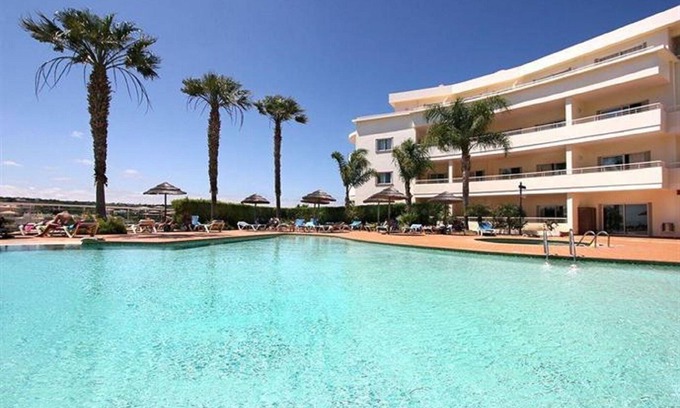 Porto de Mos Apartment | Private flat in VILA MÓS complex with a beautiful swimming pool area.