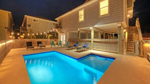 Port Aransas House | Private Pool Game Room Patio Near the Beach Palm House by AvantStay