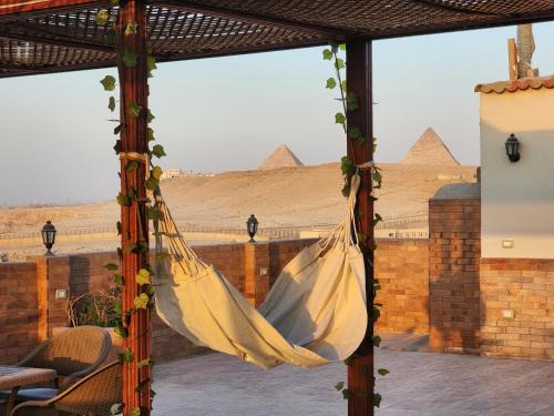 Pyramids Gardens Apartment | Private rooftop with jacuzzi and pyramids view