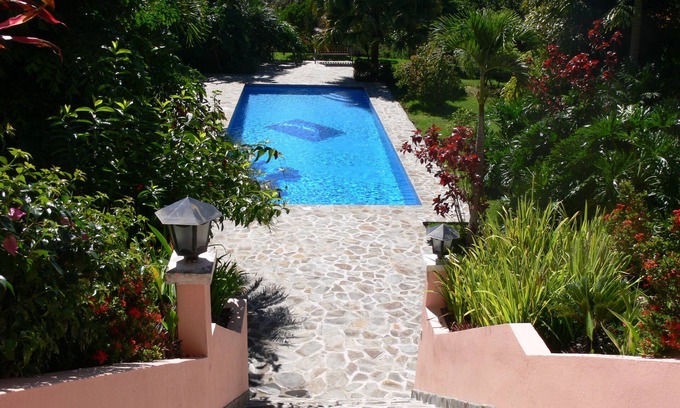 Atenas House | Private villa with lush tropical garden and big heated pool