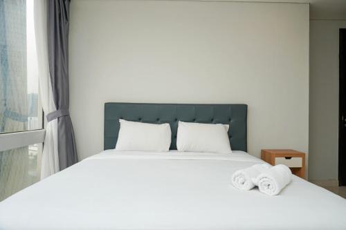 Karet Apartment | Relaxing 2BR at The Empyreal Condominium Epicentrum Apartment By Travelio
