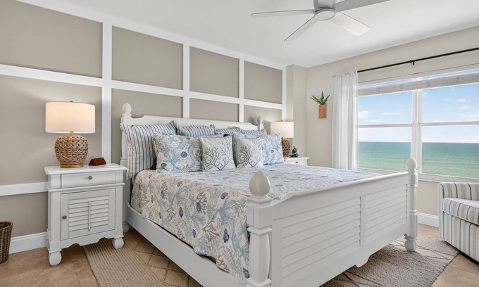 Seawinds Condo Condo | Renovated direct oceanfront corner condo with a large balcony, heated pool, and garage