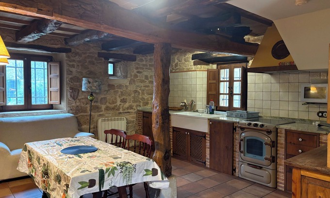 Sedano House | Renovated house with 2 bedrooms, 1 bathroom and living-dining room in stone and wood is very cozy.