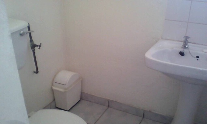 Victoria Falls Cabin | Rhinoceros Room accommodating 2