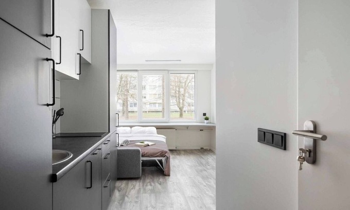 Business District Apartment | River to the City Self check in